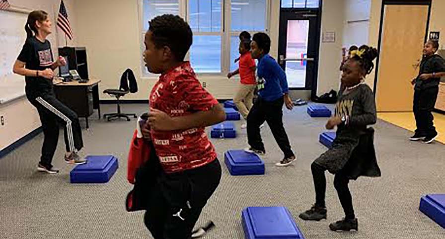 Young Medical Magnet Students Step Up Exercise Intensity With Heart Rate Monitors