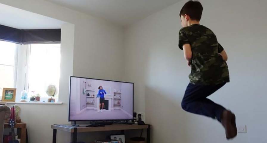Physical education online: British children join exercise lesson from home
