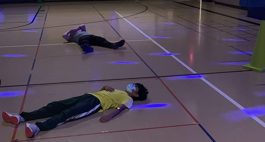 Teacher’s Creative PE Lighting Prompts Elementary Students to Calm Bodies and Minds